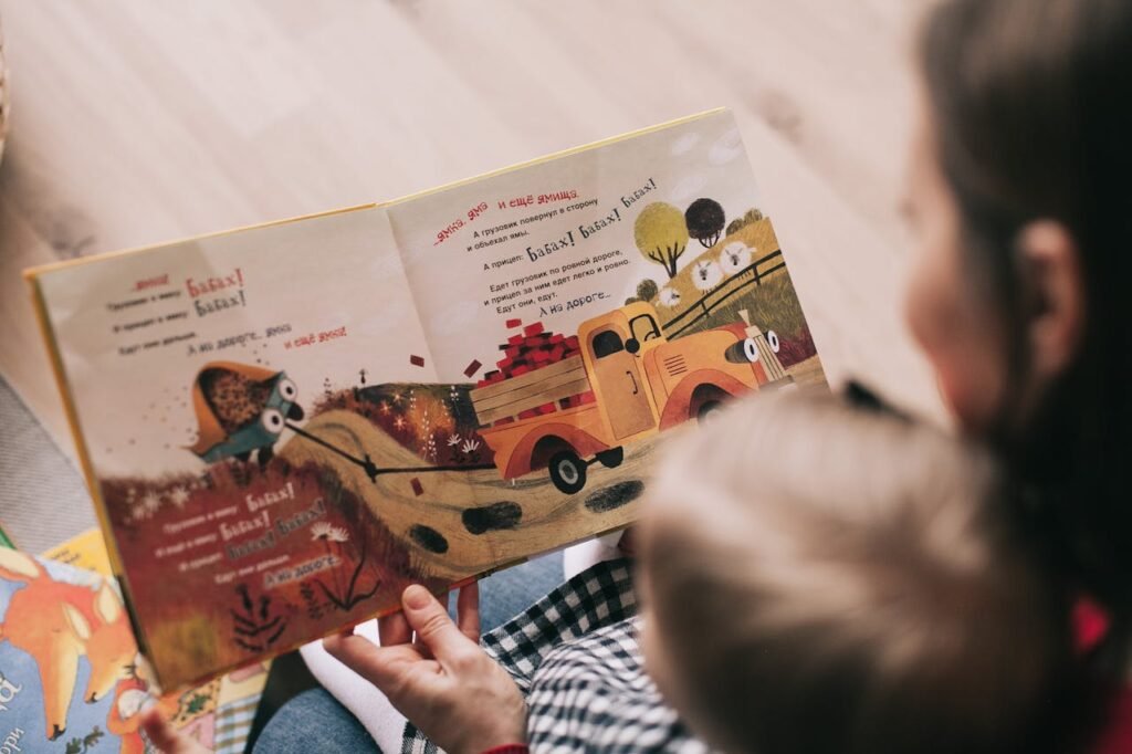 A woman reading a story to her child.