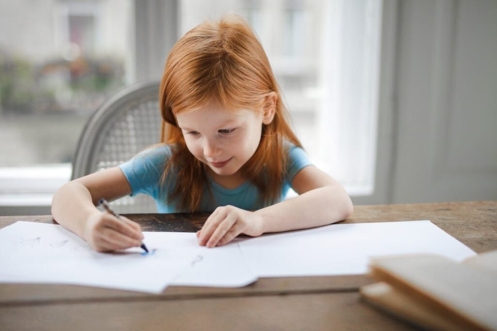 little girl doing homework.
